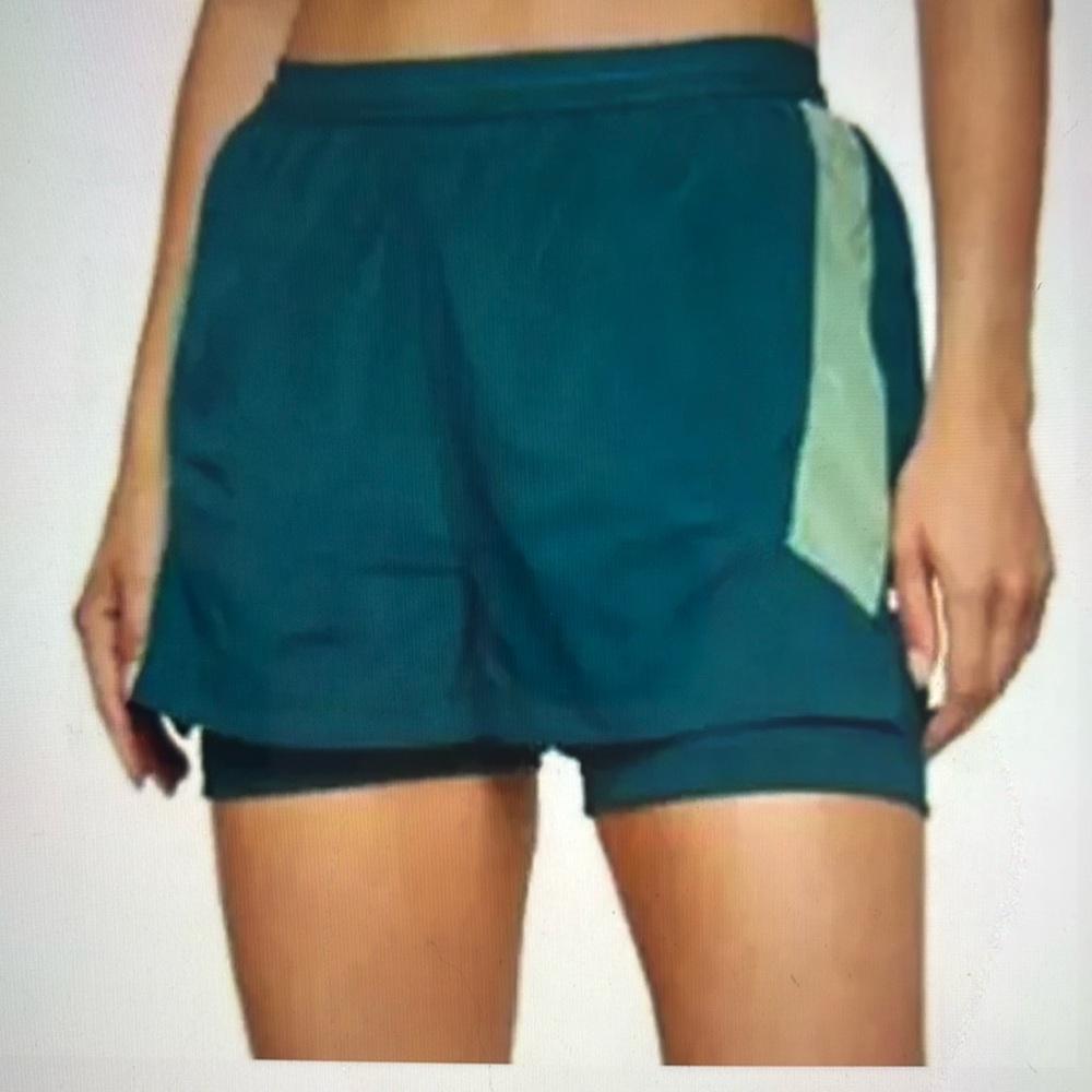 NWT Four Laps Command Shorts.   Size Large